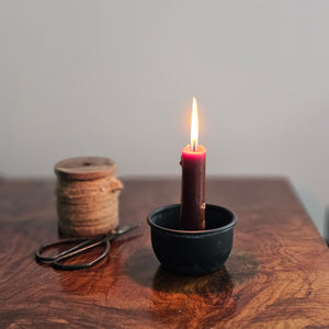 Our Blacksmith Taper Candle Cup features a rustic, matte black finish. The cup has plenty of space between the holder and the sides, making it the perfect choice for displaying a candle ring! Measures 3" in diameter with a 1" candle cup. Includes one cup. Candle not included.