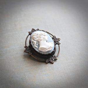 Classic old-world style is infused in these Vintage Style Cameo Brooch Pendants. Each is set in an antique-inspired frame. This classic French blue cameo also doubles as a brooch. The convenient bale soldered on the back makes it easy to convert from a brooch to a pendant. Whether at the office, or with a black tee and jeans this brooch/pendant can be worn on a chain, or simply left on the favorite blazer of choice. 