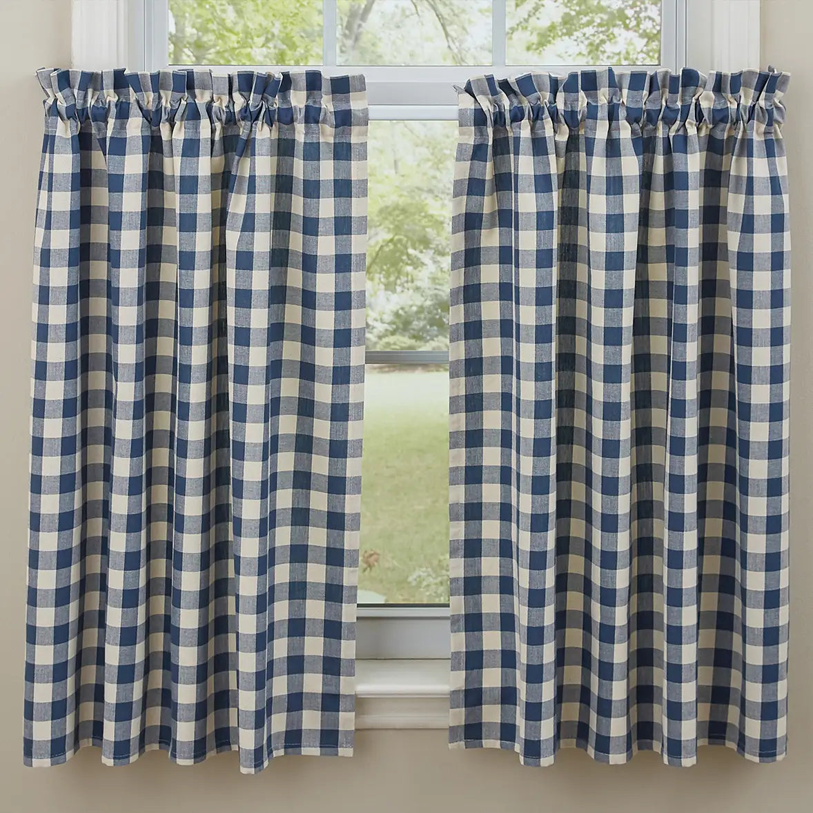 Dress up any window in cozy cottage charm with the York Blue Buffalo Check Cafe Curtains. With serene country blue and cream large-scale checks, this farmhouse curtain tier set updates your home decor with a lighthearted country feel. Whether you're going for a coastal, cottage our country look, these 100% cotton cafe curtains add the perfect combination of simplicity and elegance .&nbsp; Set of two tiers. Each is 36"L x 24"H