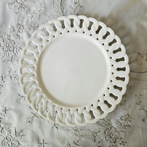 Add a romantic cottage touch with our Antique White Keepsake Dessert Plate with Lattice Trim. Made of fine porcelain, with delicate cut details along the rim, this plate brings a dreamy elegance to any occasion. The antique white glaze fits well with creamware collections. 8" 