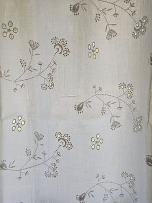 Dress up any window in breezy cottage charm with the Antique White Lace Cafe Curtains. With a creamy, off-white cotton, this semi-sheer curtain tier set features a floral eyelet and embroidered pattern of little sprigs to update your home decor with a lighthearted country feel. Whether you're going for a coastal, cottage our country look, these cafe curtains add the perfect combination of simplicity and elegance 