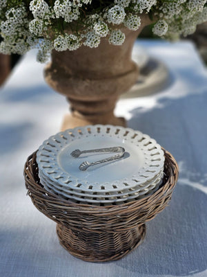 Add a romantic cottage touch with our Antique White Keepsake Dessert Plate with Lattice Trim. Made of fine porcelain, with delicate cut details along the rim, this plate brings a dreamy elegance to any occasion. The antique white glaze fits well with creamware collections. 8" 