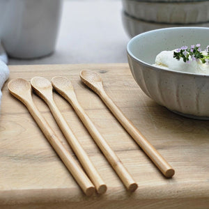 Stir up a little farmhouse style by adding a rustic touch to your utensil set. Our Bamboo Wood Long Spoons make sturdy, sustainable kitchen tools that will last a lifetime with proper care—very farmhouse. Perfect for everyday use at home or on-the-go. Hand wash. Set of four.