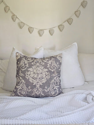 The Old World Grey Floral Pillow brings a touch of French Country cottage style to any room. Featuring a soft fabric that has a slightly aged look, making it feel as though it was found in a Paris flea market.