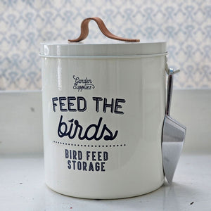 The Bird Food Storage Bin offers a touch of style to your home and garden while providing a practical solution for feeding your feathered friends. Its seamless steel construction and tough powder coating ensure durability, while the leather handle and on-trend typography add a unique design flair. Complete with a seed scoop and hanging hook for convenience. The vintage enamelware style makes a great addition to any potting shed, mudroom or any place you store your bird vittles.