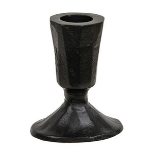 The understated elegance of our Blacksmith Taper Candle Holder lends an historic charm to any room. This artfully crafted black metal piece captures the essence of traditional metalwork with its hand-forged aesthetic, bringing timeless character to any space. The refined minimalist silhouette complements both contemporary and classic interiors, while its sturdy construction accommodates standard taper candles.