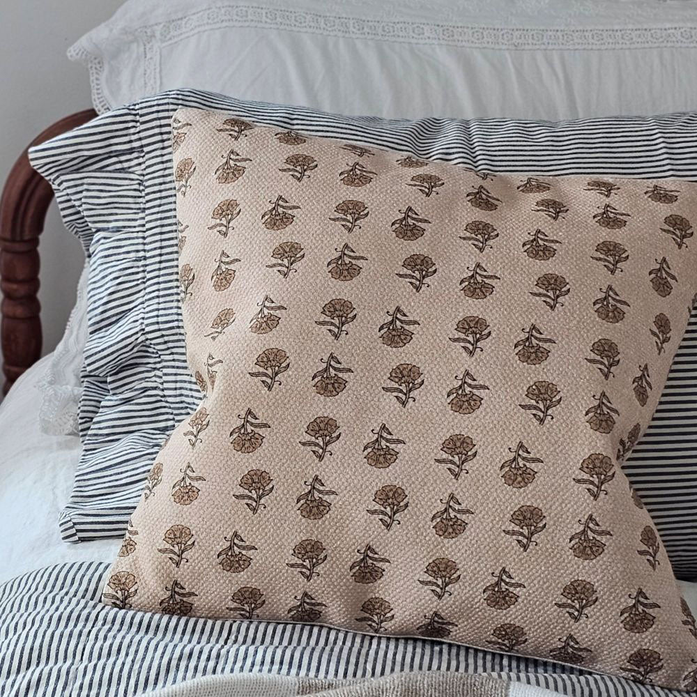 Add sweet, vintage cottage charm to any room with this Block Print Pillow with Mustard Flowers.  Features a floral pattern design on a flax linen colored background. Includes a zippered closure on the backside. Made of Cotton and Polyester insert included. 16" x 16"