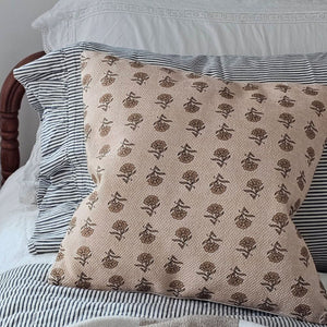 Add sweet, vintage cottage charm to any room with this Block Print Pillow with Mustard Flowers.  Features a floral pattern design on a flax linen colored background. Includes a zippered closure on the backside. Made of Cotton and Polyester insert included. 16" x 16"