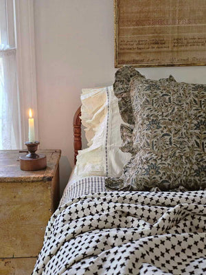 The Rustic Linen Block Print and Ruffles Pillow Cover brings texture and comfort together for sophisticated, old-world style. Made from breathable, high-quality linen with a rustic texture and natural feel that pairs beautifully with both modern and rustic interiors.

Every cover is carefully printed by hand, giving each piece its own subtle character and artisan detail.