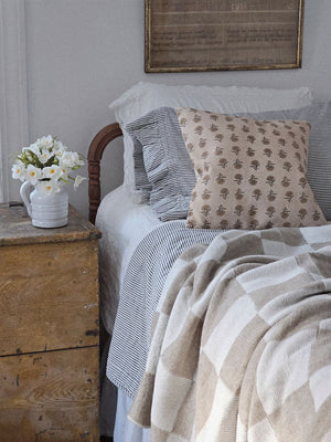 Add sweet, vintage cottage charm to any room with this Block Print Pillow with Mustard Flowers. Shown with Knit Beige and Cream Throw and Portsmouth Bedding