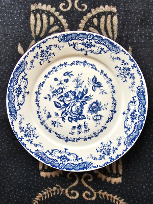 Inspired by antique transferware, our Blue Floral Transferware Plate lends French country cottage style to any shelf, tabletop or dinnerware collection. A vintage classic, transferware has adorned the shelves of American farmhouses for centuries. The delicate floral pattern in blue on an antique white background. Perfect for desserts and salads. 