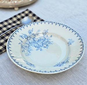 Inspired by antique transferware, our porcelain Blue Leaf Transferware Soup Bowl lends French country cottage style to any shelf, tabletop or dinnerware collection. A vintage classic, transferware has adorned the shelves of American farmhouses for centuries. The delicate floral pattern in vintage blue on an antique white background. Perfect for soups and salads. Food safe. Hand wash recommended.