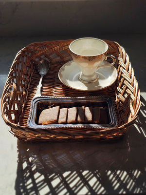 Our Braided Basket Tray offers quintessential country farmhouse style. This charming shallow wicker basket makes a beautiful presentation for farmhouse gatherings to hold napkins and utensils or add it to your home office for mail and so much more. Accessories not included. 14.5"L x 11.5”W x 3"H
