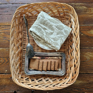 Our Braided Basket Tray offers quintessential country farmhouse style. This charming shallow wicker basket makes a beautiful presentation for farmhouse gatherings to hold napkins and utensils or add it to your home office for mail and so much more. Accessories not included. 14.5"L x 11.5”W x 3"H