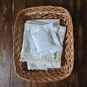 Our Braided Basket Tray offers quintessential country farmhouse style. This charming shallow wicker basket makes a beautiful presentation for farmhouse gatherings to hold napkins and utensils or add it to your home office for mail and so much more. Accessories not included. 14.5"L x 11.5”W x 3"H