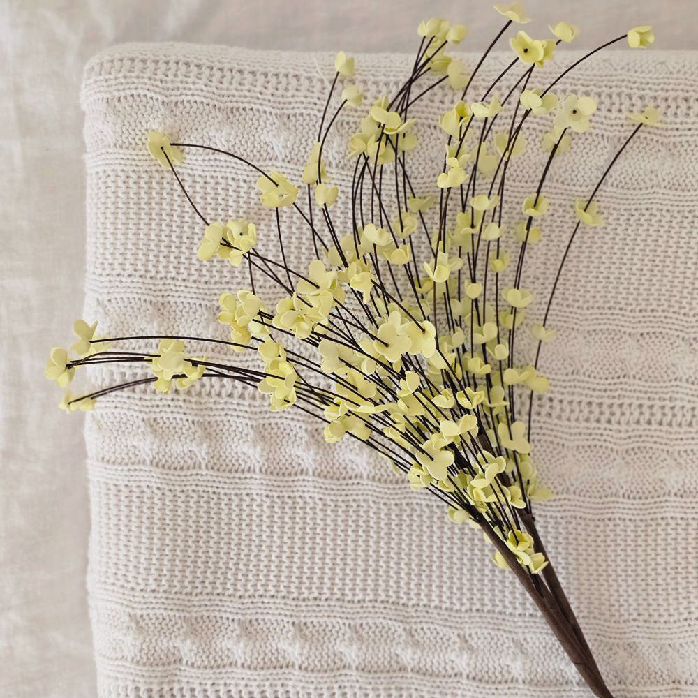 Our airy Brown Branch Blossom Spray, set of three, adds warm color and interest to your displays all year The wispy branch and delicate fabric blossoms lend easy country cottage charm. The sprays can be displayed alone for a simple country look or arranged into a bouquet. 