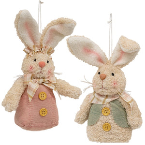 The Bunny in a Basket adds a sweet spring touch to any room. Each bunny features soft chenille fabric, blushed cheeks, posable ears, and wooden buttons. The girl bunny wears a pink fabric dress with a plaid bow and headband, while the boy bunny wears a green fabric vest with a plaid necktie. Can be used with or without the mini wall basket. Bunny measures 5.5" high by 3" wide.