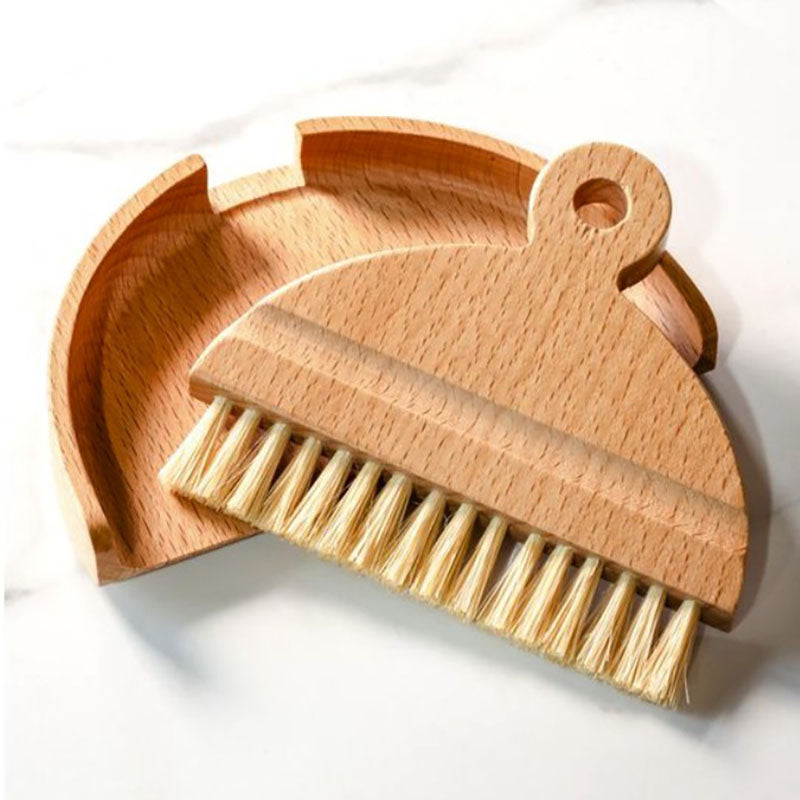 Whether you're cleaning up bread crumbs or keeping a craft room tidy, this mini dustpan and brush Butler's Table Sweeper is a must-have around the farmhouse. This set includes a wood dustpan and horsehair broom with wood handle. Keep your dining and work surfaces spotless with this compact yet powerful cleaning tool designed for effortless tidying.