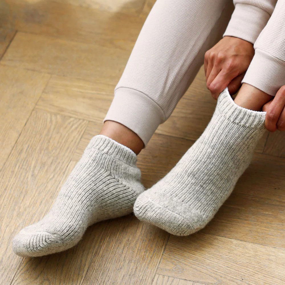 Cozy up by the fire with our Knit Cabin Socks.&nbsp;They're designed to keep your feet toasty and comfy. Wear them as a warm layer when&nbsp;skiing in the mountains or shoveling the driveway. These unisex Cabin Socks will keep your feet extra warm and dry. Let them double as a snug slipper while lounging!