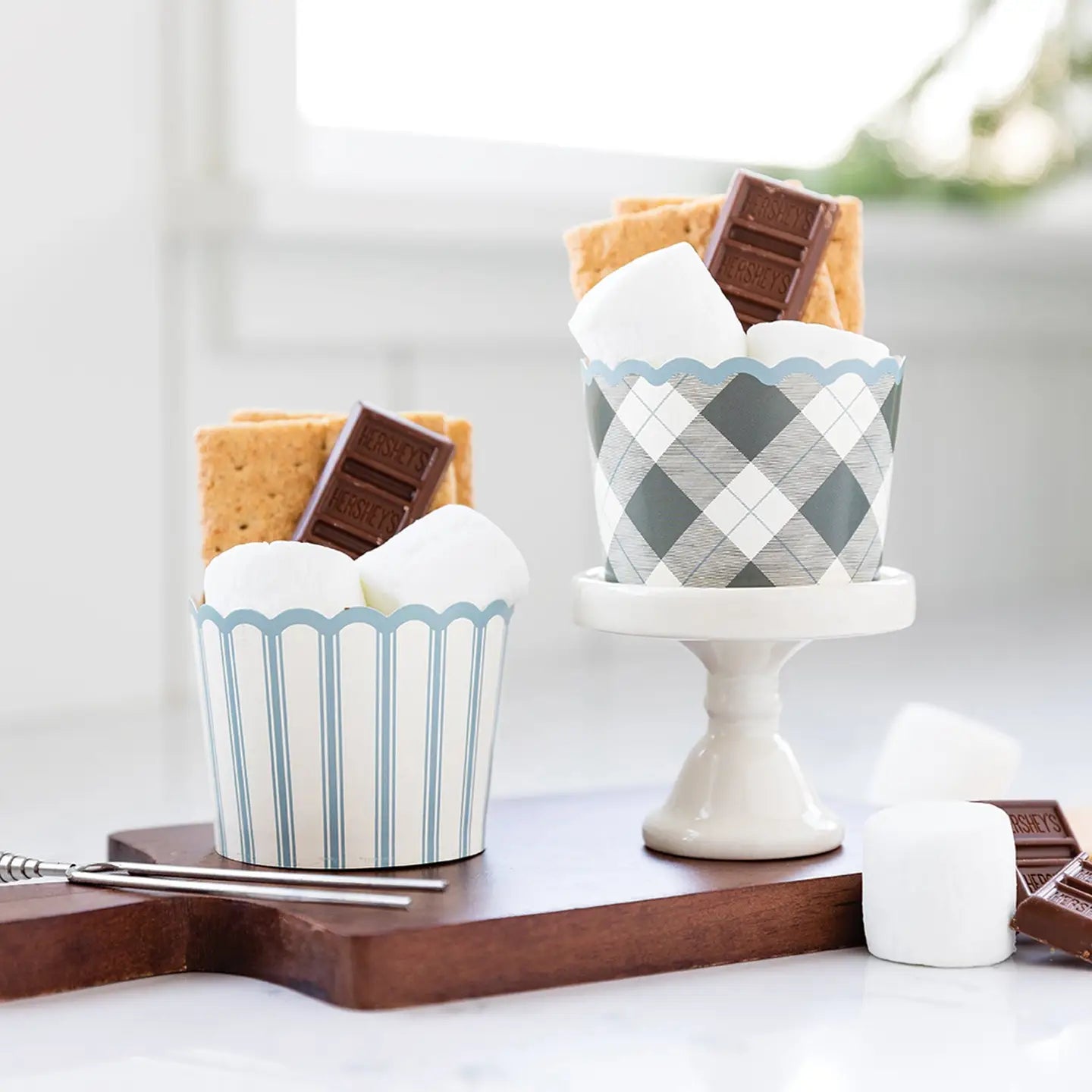 What is a summer and fall gathering without delicious treats? With classic plaid and stripe patterns these baking cups are the perfect party staple for campfire or tailgate gatherings. From cupcakes and candies to pre-made single servings of picnic fair and scoops of ice cream these cups have got you covered with a dash of vintage flair!