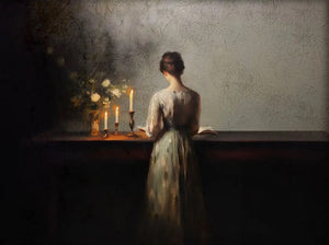 The Candlelight Reading Art Print is a vintage, moody print depicting a quiet moment of a woman reading with soft candlelight glowing at her side. Print paper size: 7 x 5. Frame not included.