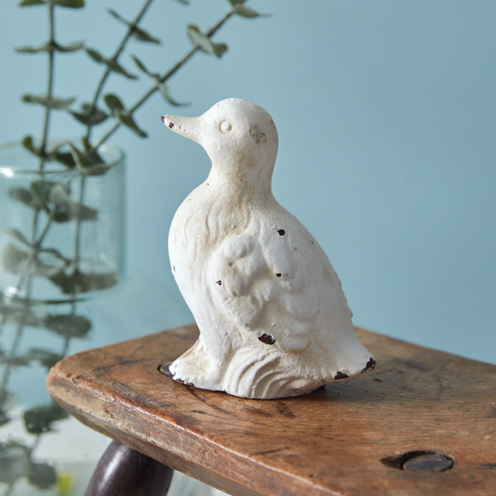 Make way for the Cast Iron Duckling! This whimsical and charming figurine is crafted from durable cast iron with a weathered white finish, adding a heartfelt touch to any space. Perfect for Spring, Easter, or just adding some quirk to your decor all year long. 3¼''L x 3¾''W x 4½''H