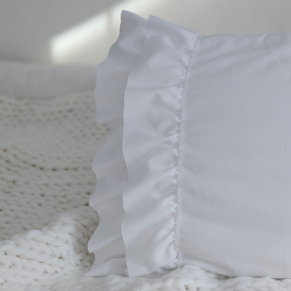 Our Cloud White Double Ruffle Pillowcase Set brings shabby chic and vintage style together to create a dreamy white cottage bedroom. This ultra soft pillowcase set features two layers of snow-white ruffled edges on each ends.

Made of high quality brushed microfiber material, these pillowcases offer you unparalleled softness and comfort. Breathable and skin-friendly, the combination of the unique design, lasting durability and softness will help you sleep well all night.

Machine washable
