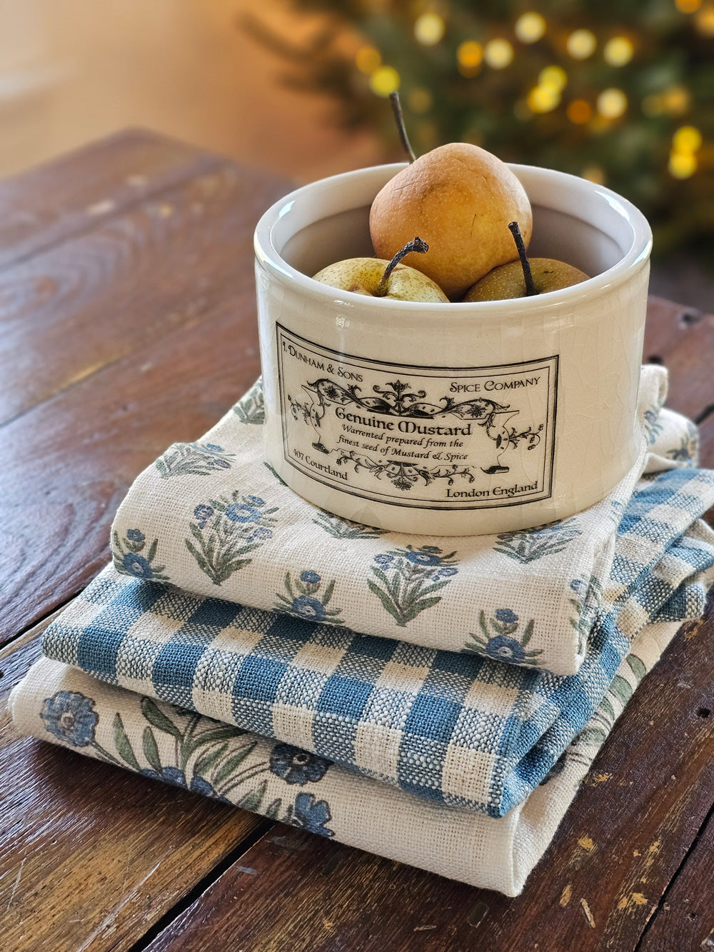 https://farmhousewares.com/cdn/shop/files/Cottage-Blue-Gingham-and-Block-Print-Tea-Towels-with-Mustard-Crock-V_2048x.jpg?v=1701696843