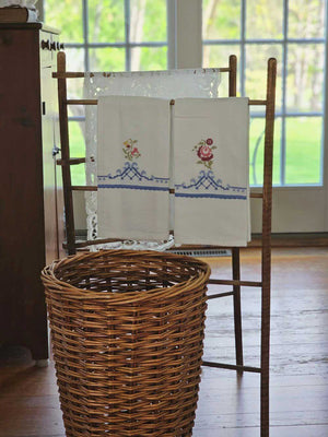 Cross Stitch Embroidered Cottage Tea Towel brings sweet nostalgic style to your summer home. Inspired by European folk art designs, each towel features cross-stitched flowers in cheerful pastel hues and a delicate crochet ribbon trim in French blue.