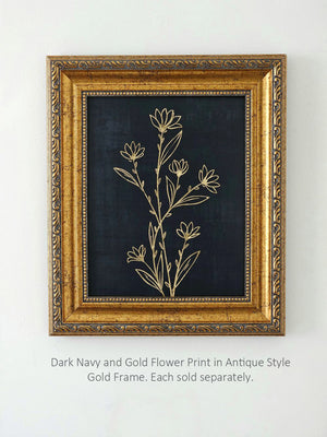 Dark navy flower print with gold outline in an antique-style gold frame on a white background.