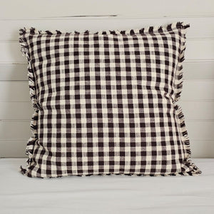 Enhance your living space with the Dark Brown Gingham Pillow, where timeless country charm meets refined design. Crafted from 100% cotton with a subtle off-white and dark brown gingham pattern, this pillow features elegant fringe edging and a discreet, easy-to-remove zipper. Its plush polyester insert offers both comfort and structure, making it a sophisticated accent that brings warmth and texture to any room. Spot clean only to preserve its quality. Measuring 18" x 18"