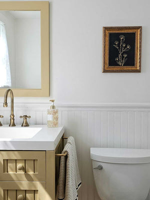 Dark Navy and gold Floral print in gold frame yellow bath