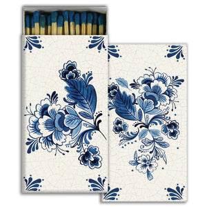 These stylish wood matches, with a Delft Blue Tile Design, are the perfect complement to any space. Modern, chic, with a vintage graphic design, they are perfect for any room. The match striker is side of the box for easy lighting. Safety matches, 50 sticks per cardboard box.