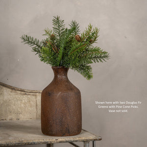 Our Douglas Fir Greens with Pine Cone Pick makes a great filler for baskets and holiday arrangements. The faux Douglas Fir Greens with Pine Cone Pick brings fresh, earthy greenery to your farmhouse decor. Perfect for adding cabin style or a rustic twist, this realistic greenery with pine cone accents provides a charming decorative accent all year long. Includes one pick. Vases not included. 13.5"H