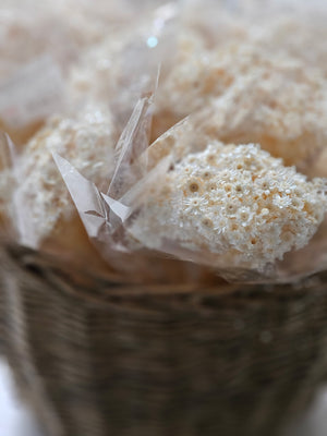 Dainty and sweet, our Dried Mini Star Flower Bundle adds the perfect touch of country to any basket or bucket. These natural small white dried blossom bundles contain approximately 125 stems and are approximately 14" in length.