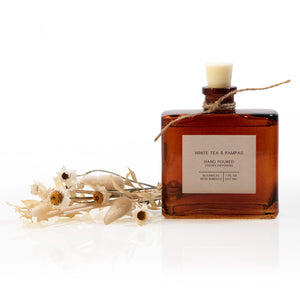 Dried flowers have been added to this scented reed difusser for a charming twist. Dried floral stems mix with classic diffuser reeds to create a fragrance diffuser that is both functional and stylish!&nbsp; This difusser will fill your home with an inviting scent, while the floral stems add natural beauty. It’s the perfect diffuser for a bedside, home office or reading room. Comes in a vintage style amber glass bottle as shown. 7 fluid ounces.