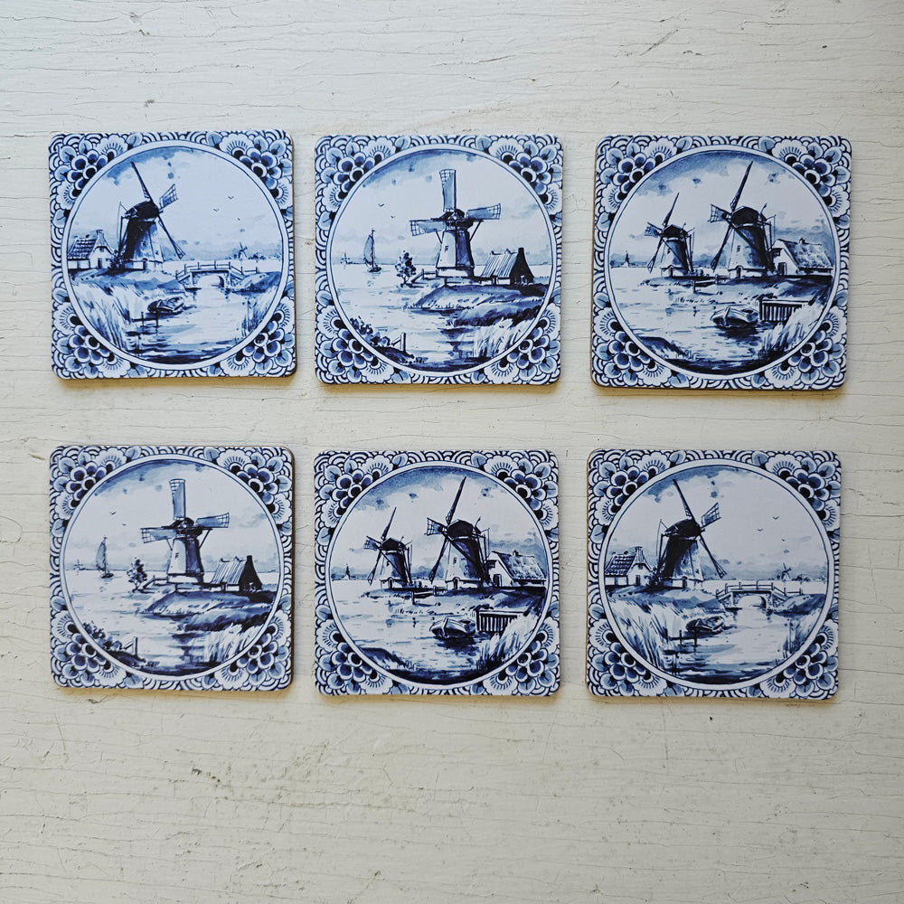 https://farmhousewares.com/cdn/shop/files/Dutch-Delft-Blue-Faux-Tile-windmill-Coasters-SET-SQ_1600x.jpg?v=1695307349