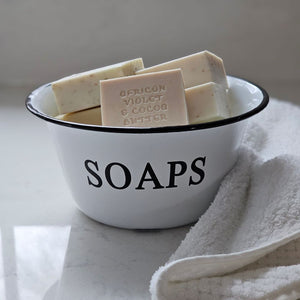 Our White Enamel Soap Bowl has a nostalgic quality that's perfect for a vintage style bathroom or guest room. The distressed white enamelware with black trim is classic farmhouse style.