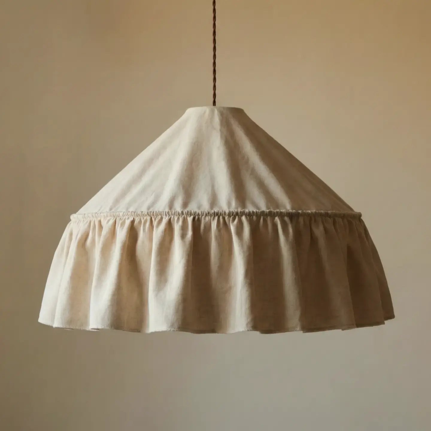 fabric-covered pendant light shade in a warm cream or off-white color, Skirted Fabric Pendant Light