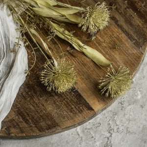 Farmhouse cottage style is made easy with our Faded Allium Blossom Spray. This faux flower spray features three leek style blossoms with faded fabric leaves. The stem is long, slender, and flexible and is easily shaped for a desired look. It can be displayed alone for a simple country look or arranged into a bouquet. It easily fits into baskets, buckets, and milk cans and more. Can be trimmed at stem if needed. Includes one spray. 20.5”H