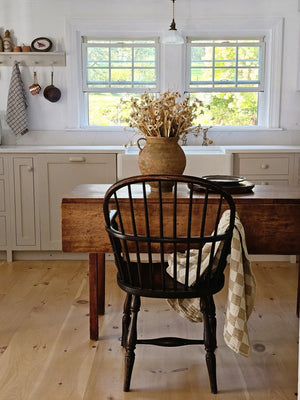 Farmhouse cottage style is made easy with our Faded Cream Wildflower and Grass Spray. This faux flower spray features a lush array of sweet daisy-like blossoms and wispy grasses. The stem is long, slender, and flexible and is easily shaped for a desired look. It can be displayed alone for a simple country look or arranged into a bouquet. It easily fits into baskets, buckets, and milk cans and more.