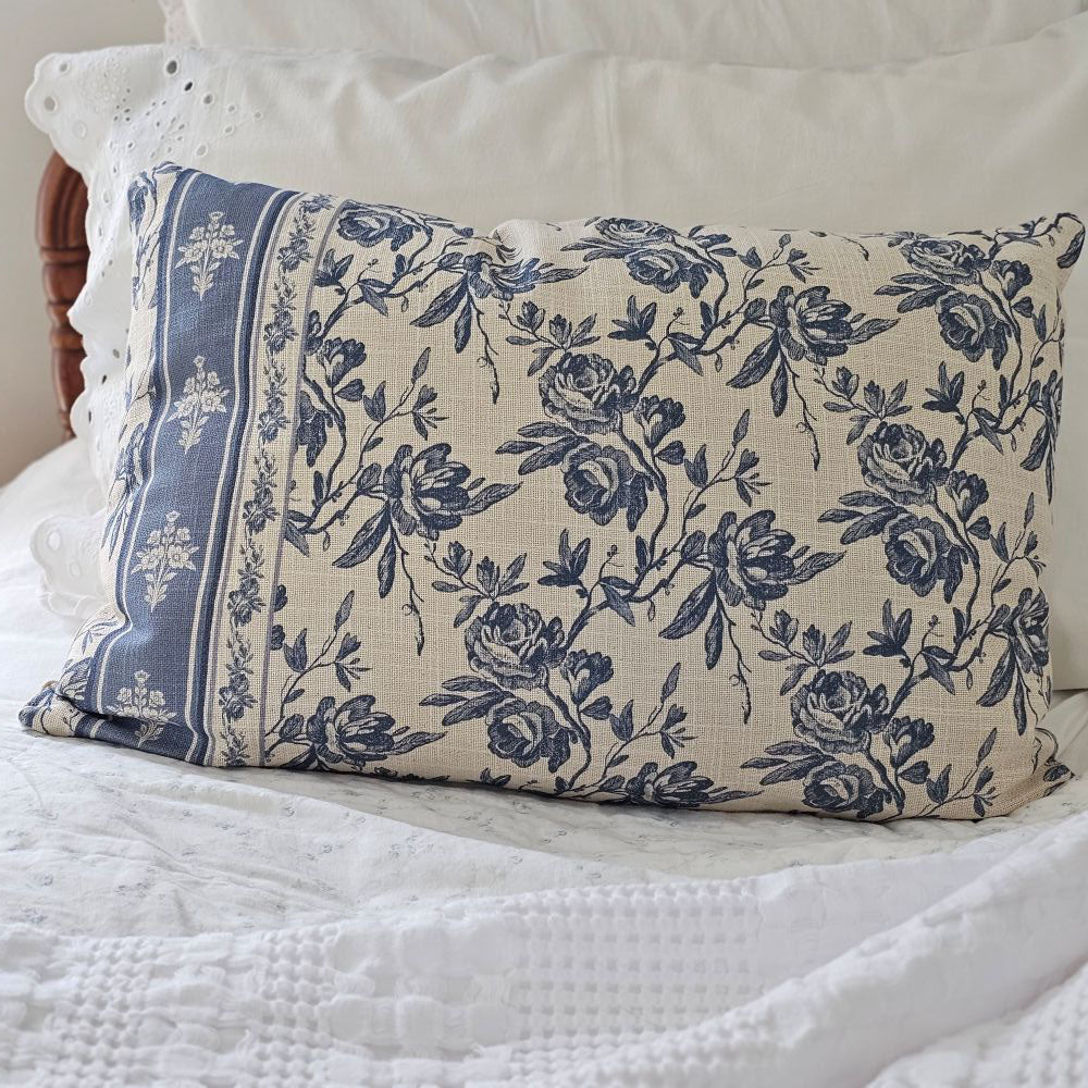 Add French country cottage charm to any room with this French Blue Floral Pillow. Features a creamy oatmeal fabric with French blue/gray floral design. Crafted from 100% cotton. Includes a zippered closure for easy removal. Polyester insert included. 22"L x 14"
