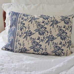 Add French country cottage charm to any room with this French Blue Floral Pillow. Features a creamy oatmeal fabric with French blue/gray floral design. Crafted from 100% cotton. Includes a zippered closure for easy removal. Polyester insert included. 22"L x 14"