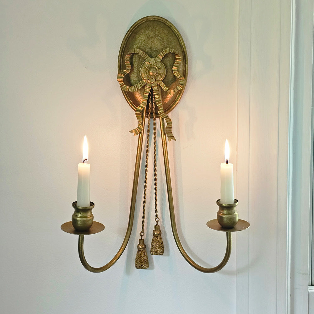 https://farmhousewares.com/cdn/shop/files/Gold-Double-Taper-Candle-Wall-Sconce-SQ_1600x.jpg?v=1693320835