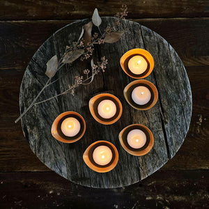 A simple and elegant way to add shimmering candlelight to any room. The antiqued brass of these Gold Tea Light Candle Bowls perfectly catches the glow of each flame. Tealight Candle not included. Set of six. Each is 2.50"W x 1"H