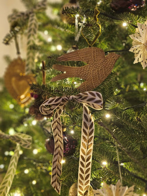Golden Spirit Bird with Embroidered Laurel Leaf Ribbon on Christmas Tree