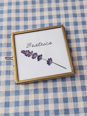 Elevate your event with our Gold and Glass Easel Picture Frame Place Card Holder Set. Featuring a refined vintage-inspired design accented in gold, these floating picture frames offer a unique way to create place card settings or table numbers that will delight guests and spark conversation. &nbsp;Perfect for weddings, parties, or any gathering, their elegant gold finish and clear glass let your creativity shine—endless possibilities await to make your event memorable! includes three empty 3 x 3 frames 