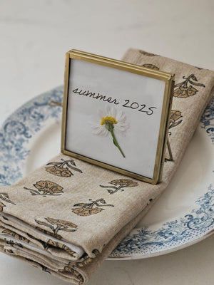 Elevate your event with our Gold and Glass Easel Picture Frame Place Card Holder Set. Featuring a refined vintage-inspired design accented in gold, these floating picture frames offer a unique way to create place card settings or table numbers that will delight guests and spark conversation. &nbsp;Perfect for weddings, parties, or any gathering, their elegant gold finish and clear glass let your creativity shine—endless possibilities await to make your event memorable! includes three empty 3 x 3 frames 