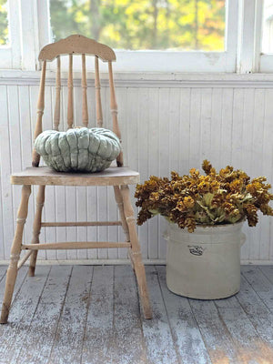 Let fall's warm vibrancy fill your farmhouse with this Golden Green Hops Bush. This faux floral pick is lush and packed with aged hops blossoms, making it an easy choice to fill any basket or vase. It features golden, green and brownish hues for an authentic faded appearance. The wire stems make it easy to shape to fit any vase or basket. Each pick is approximately 14”H.