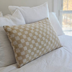 Add cheerful country style to any room with our Golden Wheat and Flax Checkered Pillow. The bright checks lend a fresh farmhouse look. The back features a solid flax linen look with a hidden zipper closure. This accent pillow is ideal for layering and lounging.